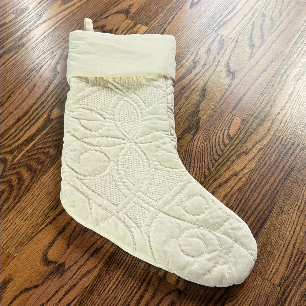 Pottery Barn cream colored quilted stocking with Jessica embroidered
